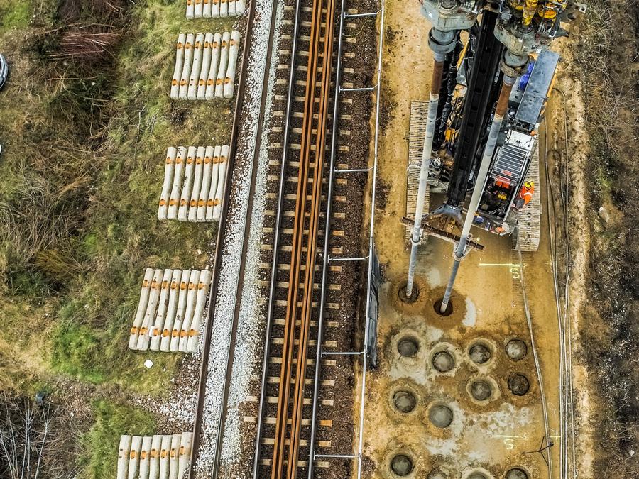 Aerial view of Keller rig working alongside railway tracks